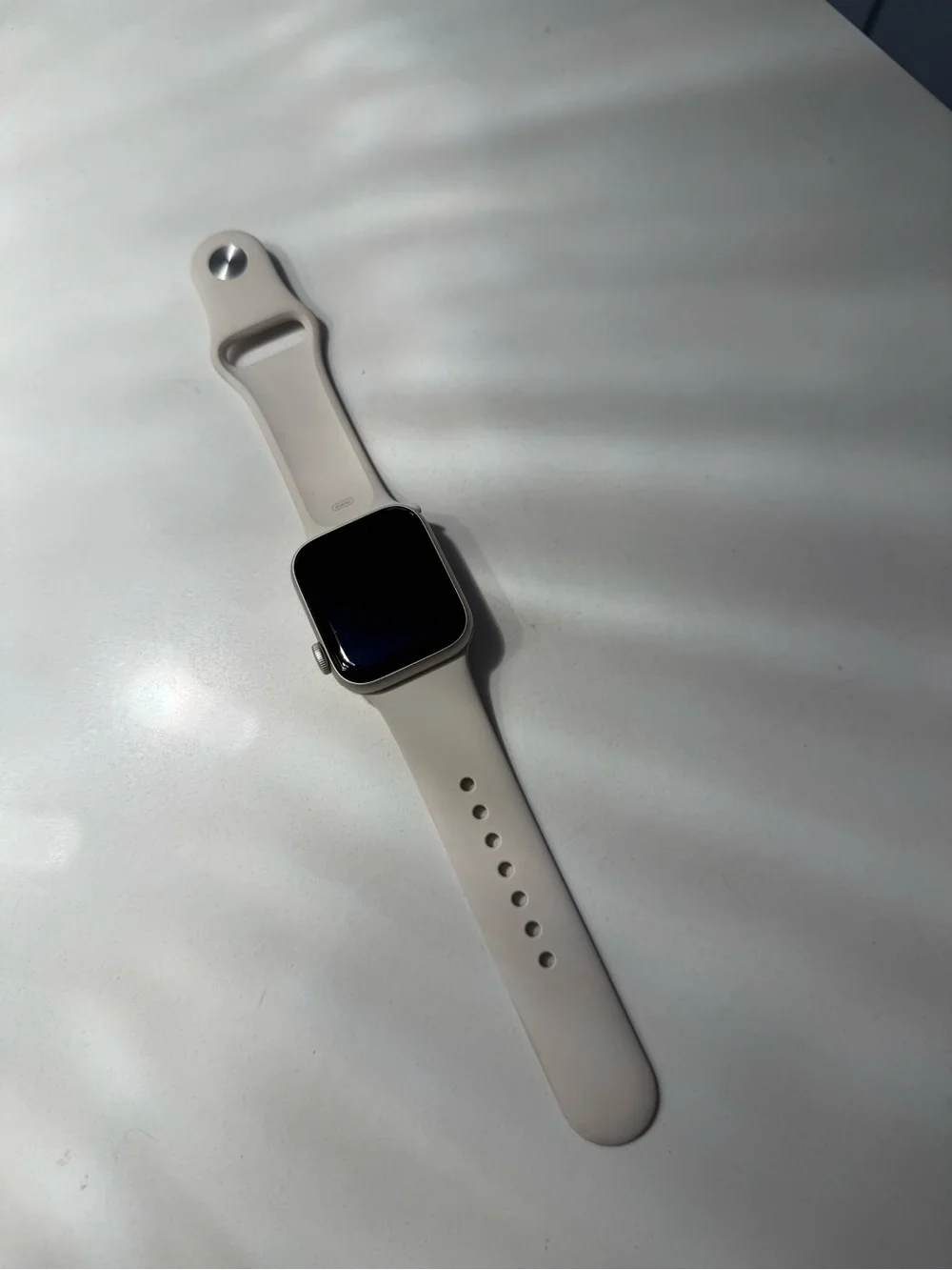 Apple 40mm size S/M. Smartwatch with Light Beige Silicone Band
